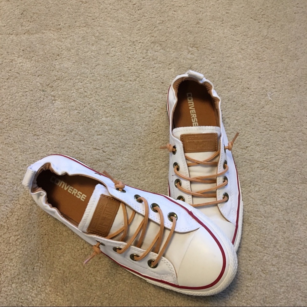 Converse slip on sneakers with leather details